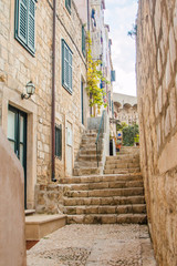      Narrow street and stairs in the Old Town in Dubrovnik, Croatia, Mediterranean ambient 