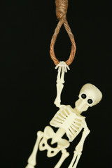 bankrupt concept, rope noose with hangman's knot hanging in front, Halloween background.