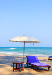 Chair and umbrella on a beautiful tropical beach