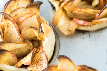 Fresh baked apple roses pies.