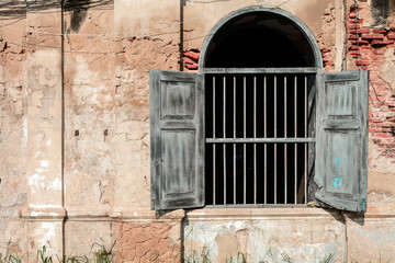 Fototapeta na wymiar old ancient window with old grunge brick wall