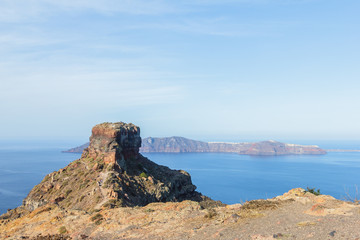 Fototapeta na wymiar Beautiful view of hill Skyros at village of Imerovigli, Caldera on volcanic Santorini island, Greece, Mediterranean sea, Europe 