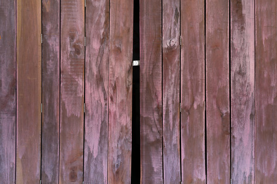 Texture of old wooden folding doors