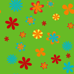 Seamless floral background on the green