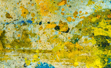 colorful paint drops on the floor abstract background unfocused