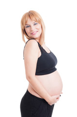 Lovely young pregnant lady smiling happy