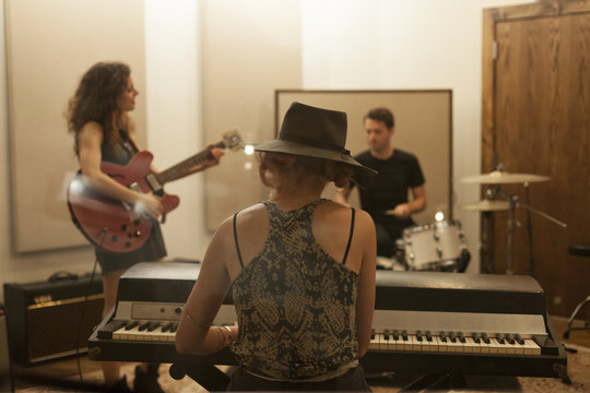 Young musicians practicing at a rehearsal space