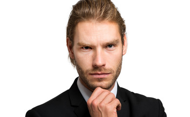 Serious handsome businessman on white background 