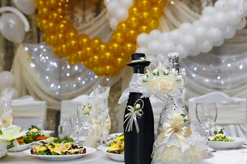 Bottles with wine on a wedding table