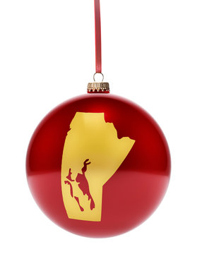recommend clip art: Red bauble with the golden shape of Manitoba.(series)