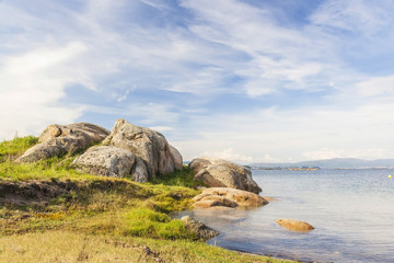 Fototapeta na wymiar Coastal rocks at hight tide