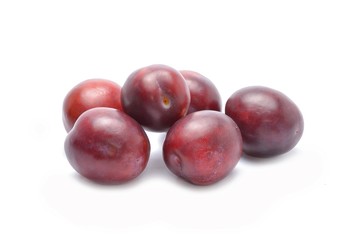 plums isolated on white background