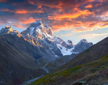 Colorful autumn sunrise in the Caucasus mountains.