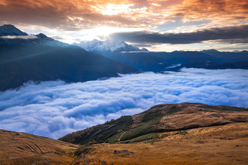 Fototapeta na wymiar Foggy autumn morning in the Caucasus mountain.