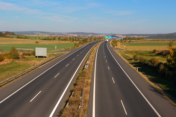 Fototapeta na wymiar Highway with four lanes. Transportation concept.