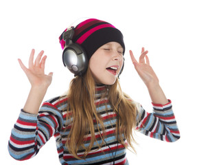 Girl with headphones listening to music.