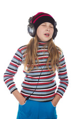 Girl with headphones listening to music.