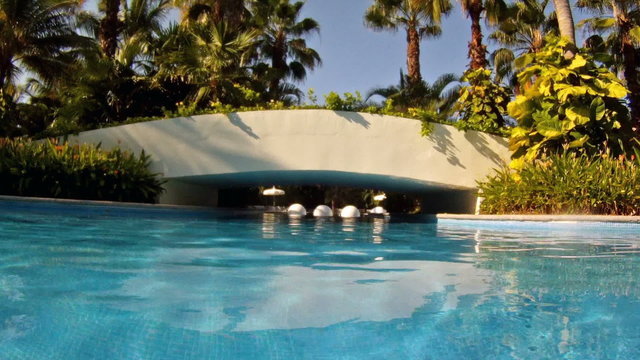 Resort swimming pool and foot bridge tropical luxury HD 0079