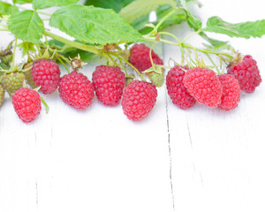 macro image of fresh raspberry on white table