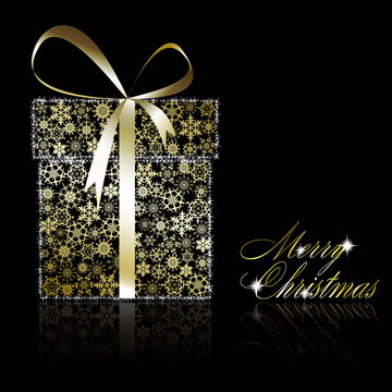 Golden Christmas  gift bpx made of gold snowflakes with stars on