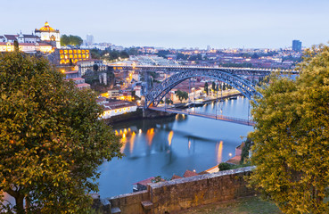 Evening view of Dom Luis I Bridge and Duoro river, Porto, Portug