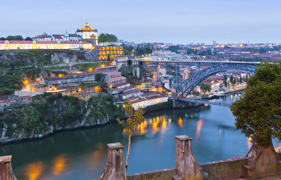 Evening view of Dom Luis I Bridge and Duoro river, Porto, Portug