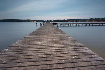 Obraz premium Wooden jetty on city beach of Olsztyn