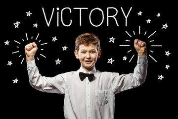 Victory red-haired boy