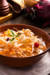 Ceramic bowl of sauerkraut vertical