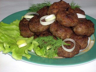 Cutlet of beef and pork fried in butter with garnish