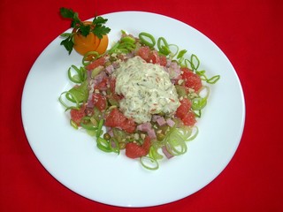 Grapefruit salad with ham, celery and cucumber sauce