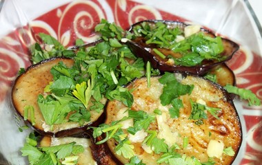 Eggplant fried in olive oil with garlic and parsley