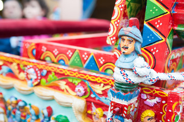 Close up view of a colorful detail of a typical sicilian cart