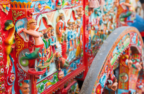Close up view of a colorful detail of a typical sicilian cart