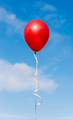 Balloons against the blue sky