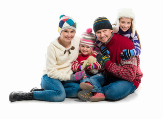 happy family portrait in warm clothes