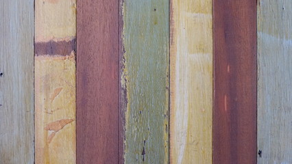 Multicolor background of gather piles of wood.