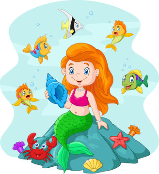 Happy little mermaid holding seashell the rock surrounded by fishes