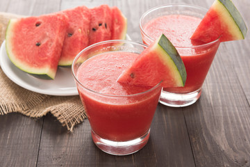 Healthy watermelon smoothie on a wood table