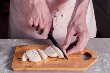 Chopping mozzarella for pizza