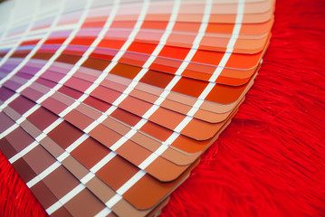 open red Pantone sample colors catalogue