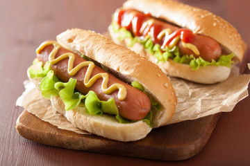 hot dog with ketchup mustard and vegetables