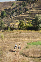 Young couple in love riding