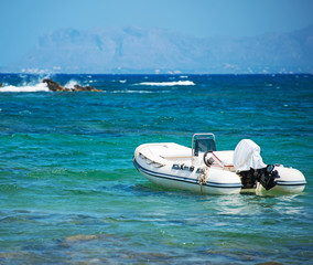 Inflatable motor boat on sea. Space for your text.