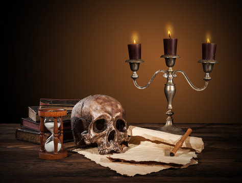 Still life art photography on human skull skeleton