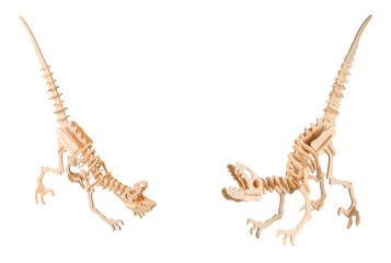 Set of a wooden dinosaurs isolated on a white background