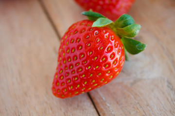 Fresh strawberries on wooden table