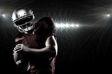 Composite image of american football player in looking away