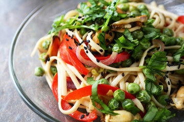 asian noodles with roasted seafood and vegetables