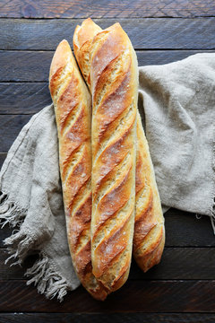 Fresh French Baguette On Napkin